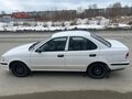 1999 Nissan Sunny B15, белый - вид 4