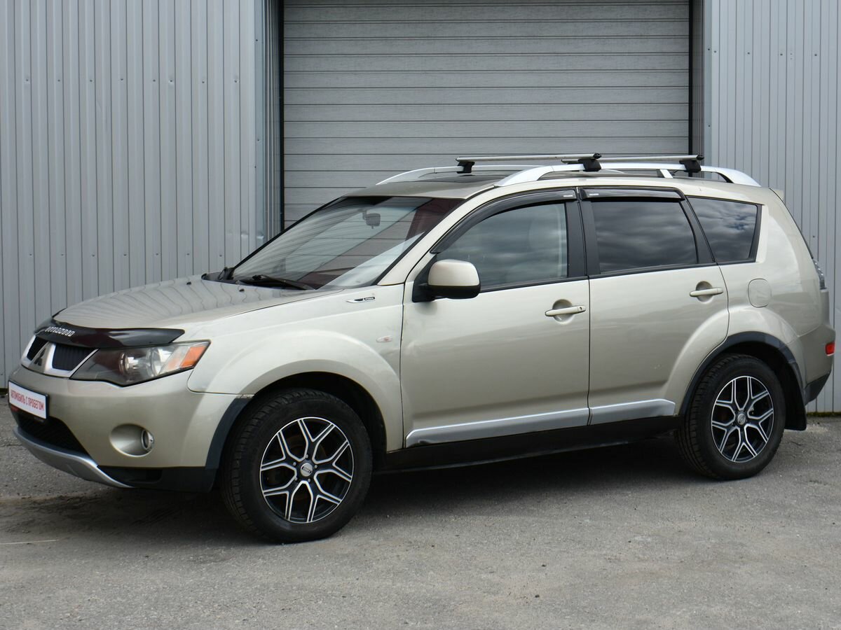 Открыть фотографии: Mitsubishi Outlander II
