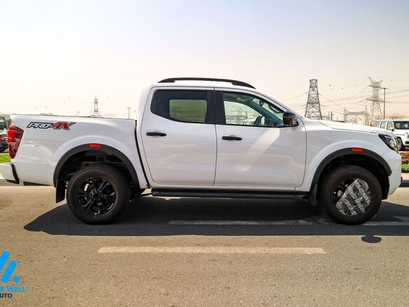 2026 Nissan Navara (Frontier) IV (D23) Рестайлинг, белый - вид 4