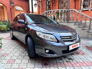 2010 Toyota Corolla X (E140, E150), серый, 990000 рублей, вид 3