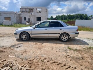 2001 Mitsubishi Carisma I Рестайлинг, серебристый, 280000 рублей, вид 4