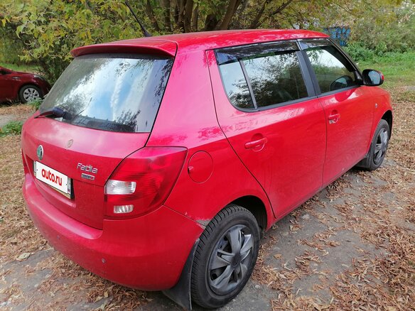 2011 Skoda Fabia II Рестайлинг, красный