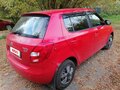2011 Skoda Fabia II Рестайлинг, красный