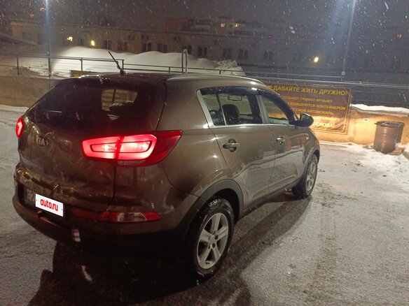 2014 Kia Sportage III Рестайлинг, коричневый, 1440000 рублей - вид 5
