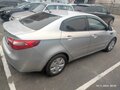 2014 Kia Rio 4-speed III, серебристый, 915000 рублей - вид 2