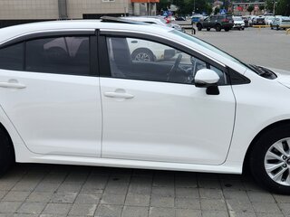 2021 Toyota Corolla XII (E210), белый, 1730000 рублей, вид 4