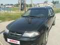 2010 Daewoo Nexia I Рестайлинг, чёрный, 335000 рублей - вид 2