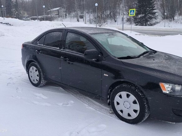 2007 Mitsubishi Lancer X, чёрный, 700000 рублей - вид 6