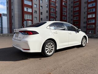 2021 Toyota Corolla XII (E210), белый, 1900000 рублей, вид 4