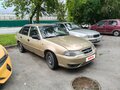 2010 Daewoo Nexia I Рестайлинг, бежевый, 140000 рублей - вид 1