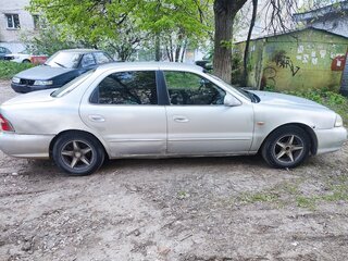 1999 Kia Clarus II, серый, 97000 рублей, вид 4
