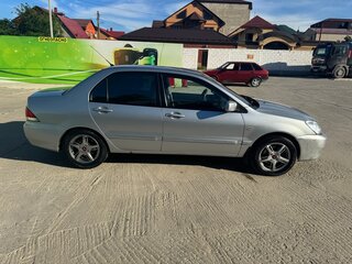 2009 Mitsubishi Lancer Classic IX Рестайлинг, серебристый, 469000 рублей, вид 3
