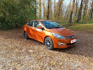 2014 Hyundai Solaris I Рестайлинг, оранжевый, 999000 рублей, вид 4