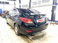 2012 Hyundai Solaris I, чёрный, 890000 рублей - вид 3