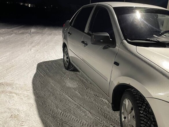 2012 Lada (ВАЗ) Granta I, серебристый, 320000 рублей - вид 9