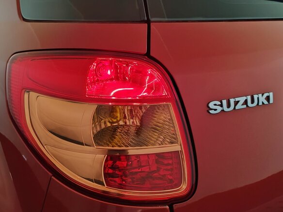 2010 Suzuki SX4 I (Classic) Рестайлинг, оранжевый, 750000 рублей - вид 23
