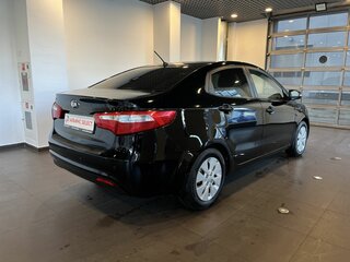 2014 Kia Rio 4-speed III, чёрный, 711000 рублей, вид 3