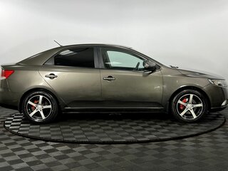 2010 Kia Cerato 5-speed II, коричневый, 660000 рублей, вид 5