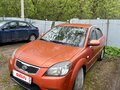 2011 Kia Rio II Рестайлинг, оранжевый, 490000 рублей