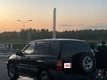 1999 Chevrolet Tracker II, чёрный - вид 4