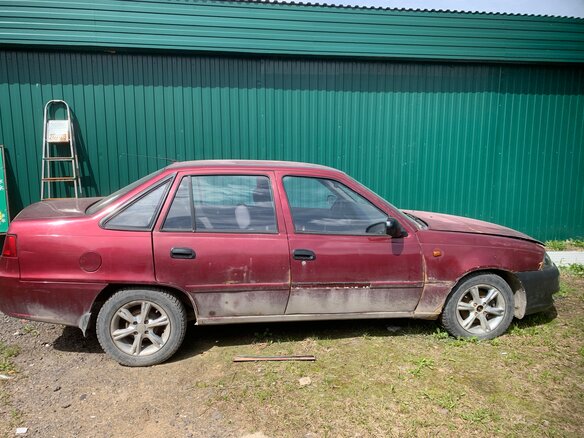 2012 Daewoo Nexia I Рестайлинг, пурпурный, 140000 рублей - вид 2