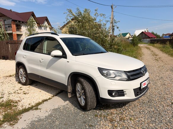 2015 Volkswagen Tiguan I Рестайлинг, белый - вид 1