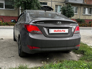 2014 Hyundai Solaris I Рестайлинг, коричневый, 720000 рублей, вид 4
