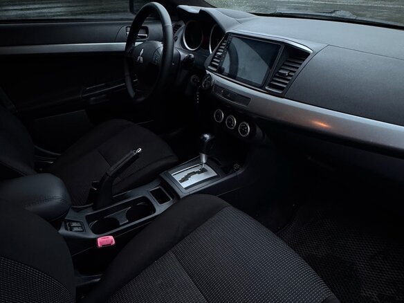 2010 Mitsubishi Lancer X, чёрный, 685000 рублей - вид 10