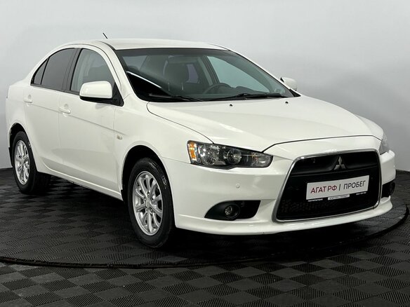 2013 Mitsubishi Lancer X Рестайлинг, белый, 960000 рублей - вид 3
