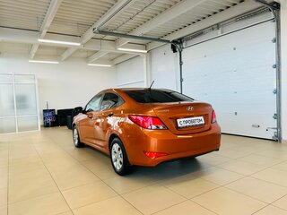 2014 Hyundai Solaris I Рестайлинг, оранжевый, 1449999 рублей, вид 4