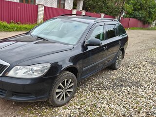 2011 Skoda Octavia II (A5) Рестайлинг, чёрный, 430000 рублей, вид 1