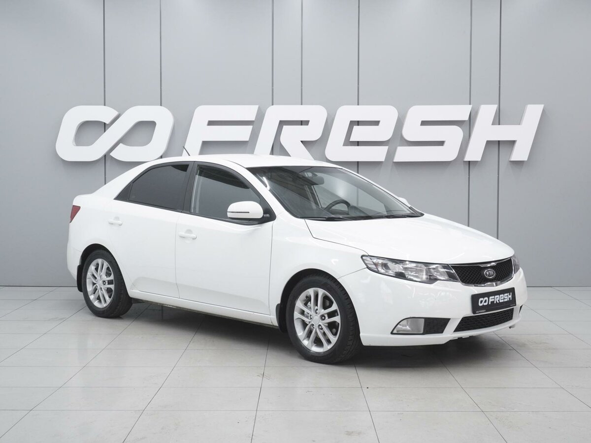 Открыть фотографии: Kia Cerato II