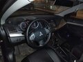 2012 Mitsubishi Lancer X Рестайлинг, чёрный, 850000 рублей - вид 1