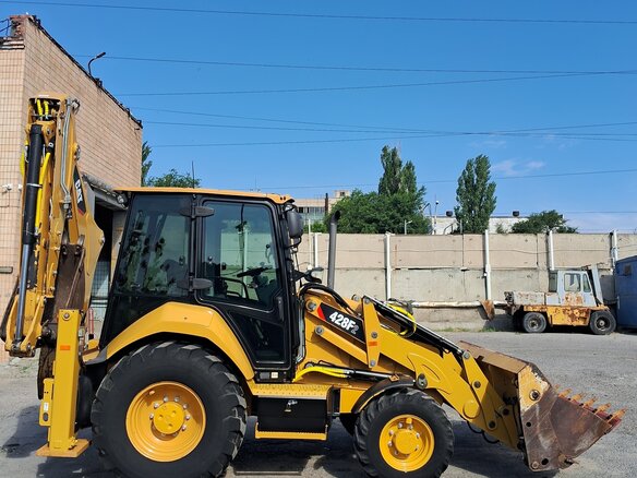 2019 Caterpillar 428F2, жёлтый, 7540000 рублей - вид 6