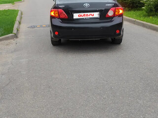 2010 Toyota Corolla X (E140, E150), чёрный, 595000 рублей, вид 3