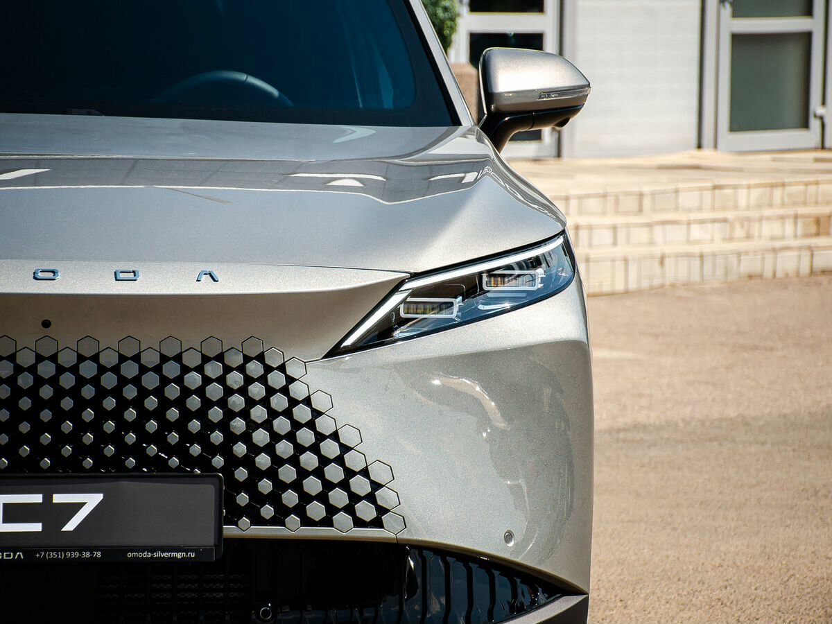 Открыть фотографии: Omoda C7