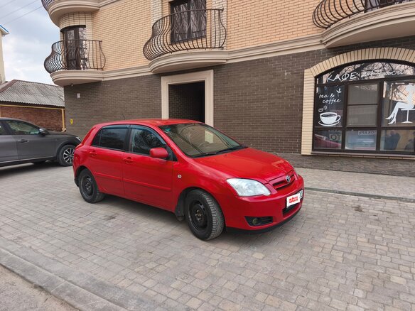 2004 Toyota Corolla IX (E120, E130) Рестайлинг, красный, 359000 рублей - вид 1