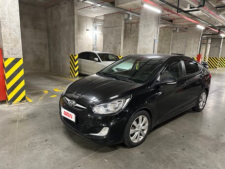 2011 Hyundai Solaris I, чёрный, 930000 рублей, вид 1