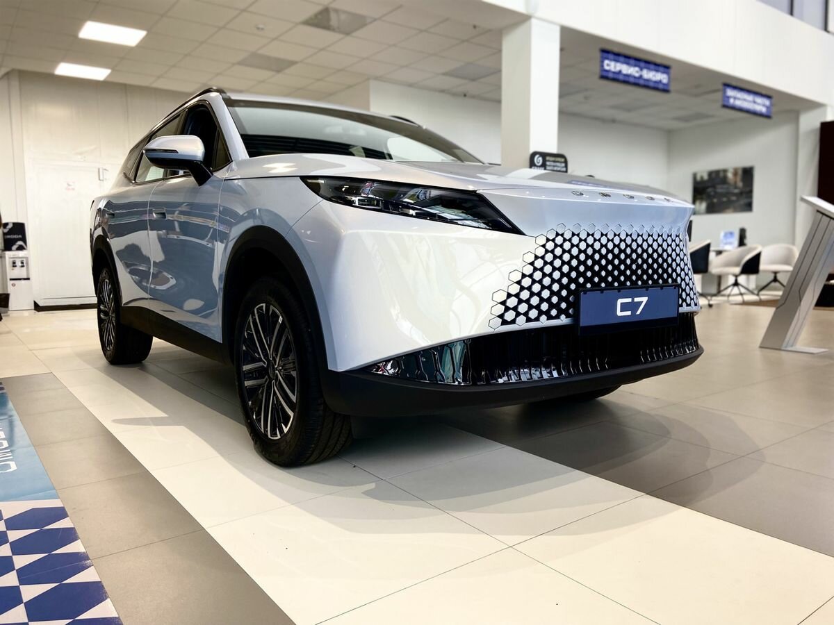 Открыть фотографии: Omoda C7