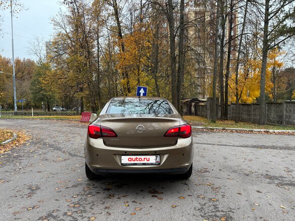 2012 Opel Astra J Рестайлинг, коричневый, 1150000 рублей - вид 4