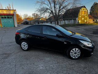 2012 Hyundai Solaris I, чёрный, 655000 рублей, вид 4