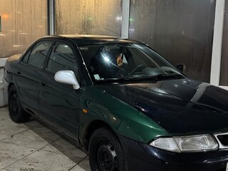1999 Mitsubishi Carisma I, зелёный, 180000 рублей, вид 2