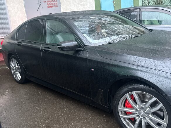 2018 BMW 7 серии 750d xDrive VI (G11/G12), чёрный - вид 2