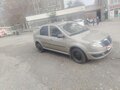 2011 Renault Logan I Рестайлинг, бежевый, 285000 рублей - вид 2