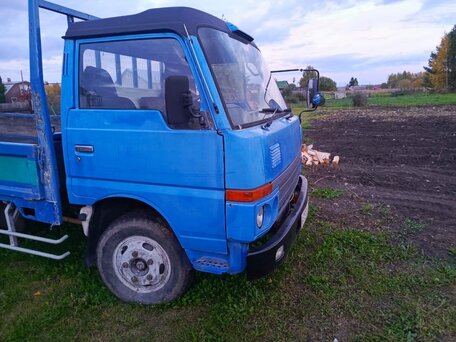 1987 Nissan Atlas, синий, 850000 рублей, вид 1