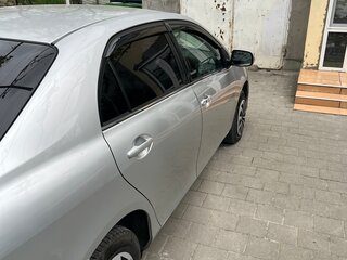 2009 Toyota Corolla Axio X (E140, E150) Рестайлинг, серебристый, 750000 рублей, вид 3