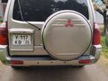 2004 Mitsubishi Pajero III Рестайлинг, бежевый, 1200000 рублей - вид 1