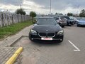 2009 BMW 7 серии 730d V (F01/F02/F04), чёрный, 1404777 рублей - вид 1