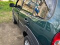 2011 Chevrolet Niva I Рестайлинг, зелёный, 430000 рублей - вид 3