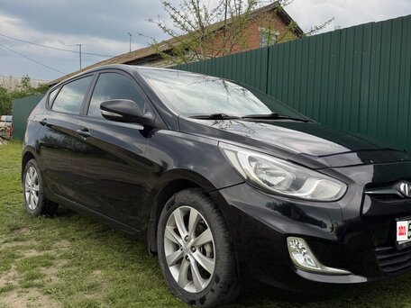 2012 Hyundai Solaris I, чёрный, 660000 рублей, вид 3